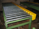 Chain driven roller conveyor