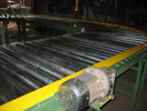 Chain driven roller conveyor